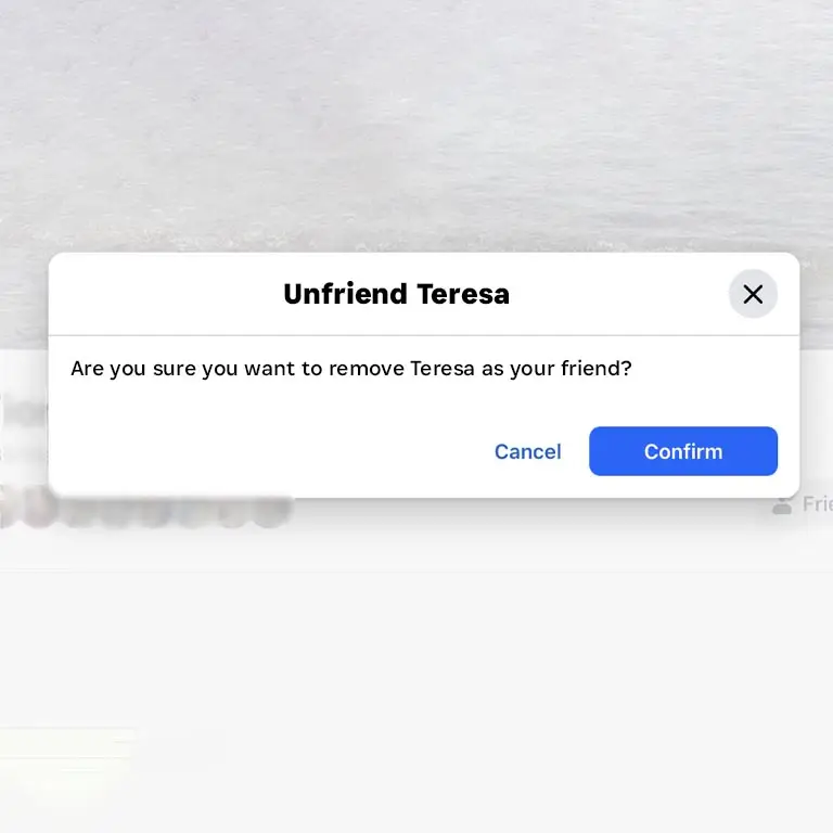 Facebook unfriend confirmation pop-up symbolizing social media rejection and its emotional impact.